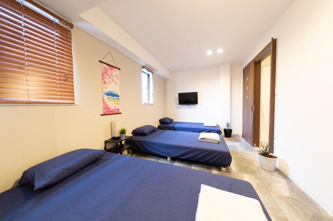 Guest House Megu-Chan โอซาก้า ภายนอก รูปภาพ